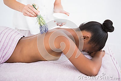 Pretty woman enjoying an aromatherapy massage Stock Photo