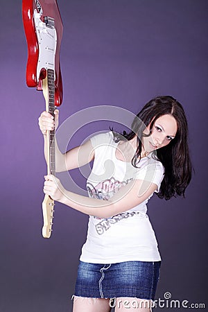 Pretty woman with guitar Stock Photo