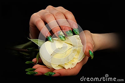 Pretty woman hand with perfect painted nails on black background Stock Photo