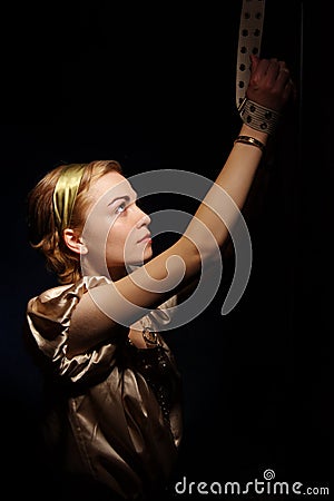 Pretty woman with her hands tied Stock Photo