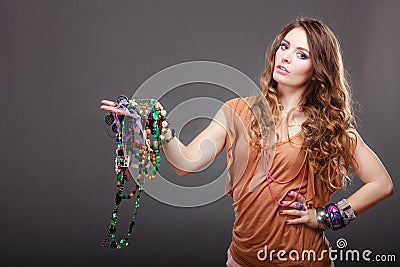 Pretty woman with jewelry necklaces ring bracelets Stock Photo