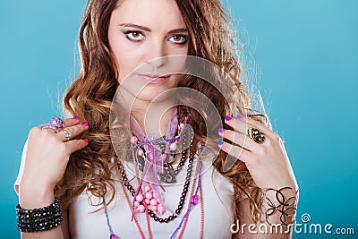 Pretty woman with jewelry necklaces ring bracelets Stock Photo