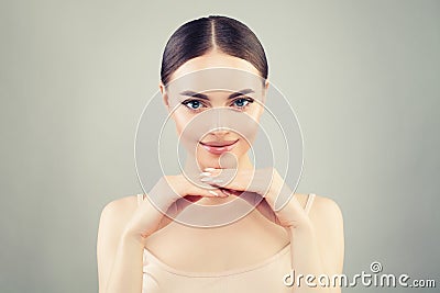 Pretty woman spa model with clear skin. Skin care, wellness and cosmetology Stock Photo