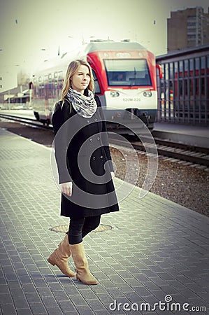 Pretty woman waitting a train Stock Photo