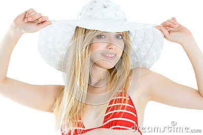 Pretty woman wearing red swimsuit and hat Stock Photo