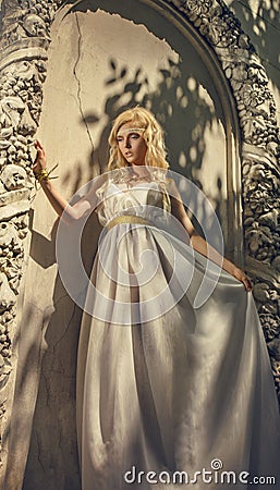 Pretty woman in white dress in the Greek style Stock Photo