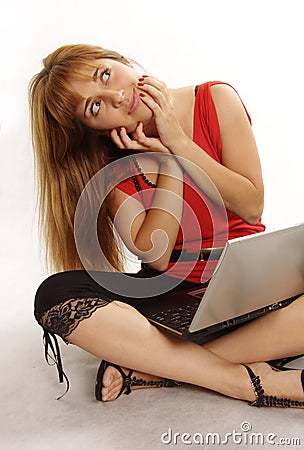 Pretty women relaxing and using laptop computer Stock Photo