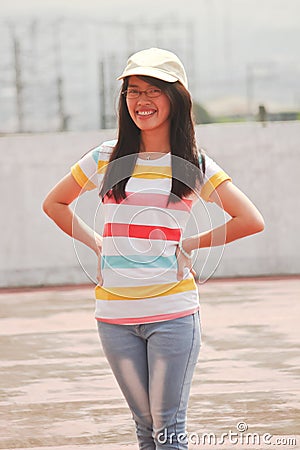 Pretty young Asian girl with glasses Stock Photo