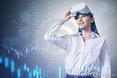 Pretty young caucasian businesswoman with VR glasses and abstract hologram of glowing forex chart on blurry background. Economy, Stock Photo