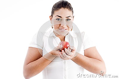 Pretty young caucasian holding an apple Stock Photo
