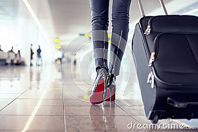 Pretty young female passenger at the airport Stock Photo