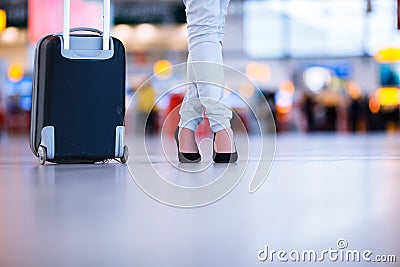 Pretty young female passenger at the airport Stock Photo