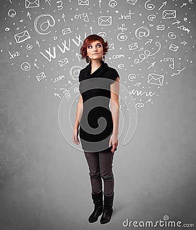 Pretty young girl with abstract white media icon doodles Stock Photo