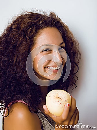 Pretty young real tenage girl eating apple close Stock Photo