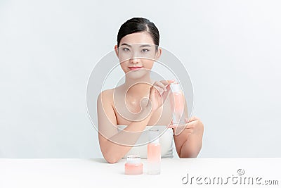 Pretty young woman advertising cosmetics in blog Stock Photo