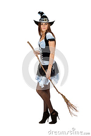 Pretty young woman with a besom Stock Photo