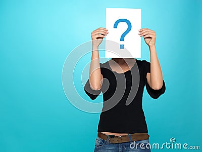 Pretty young woman showing a question mark Stock Photo