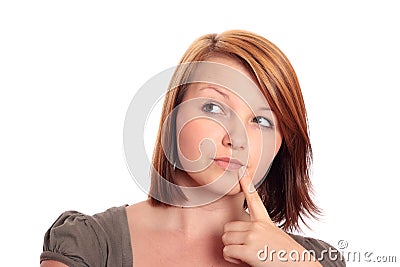 Pretty young woman in thought Stock Photo