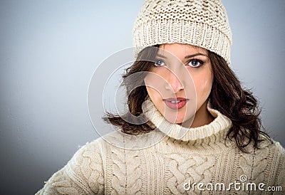 Pretty young woman in winter woollens Stock Photo