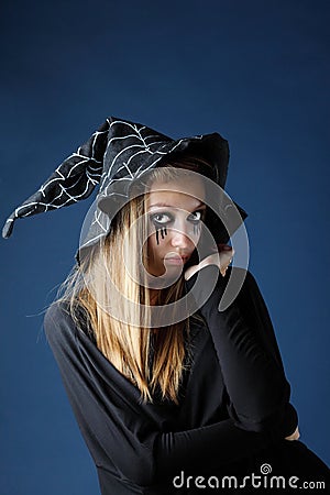 Pretty zombie girl with black tears and cut throat in hat Stock Photo