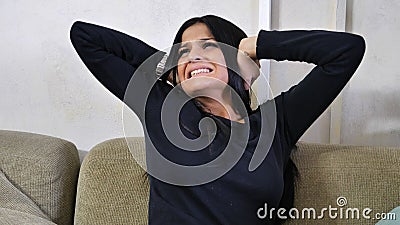 Young woman covering her ears, too much noise Stock Photo