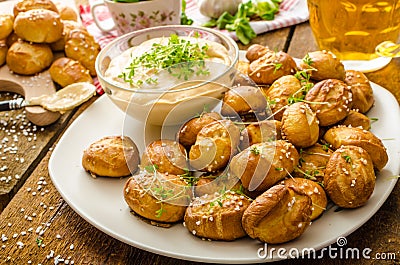 Pretzel rolls with cheese dip Stock Photo