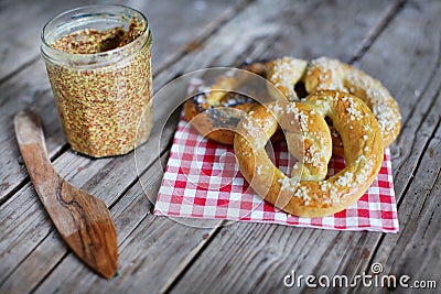 Pretzels with wholegrain mustard, food snack bread picnic Stock Photo