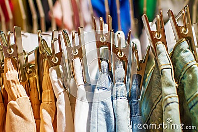 Preview jeans hanging on a hanger in the store Stock Photo