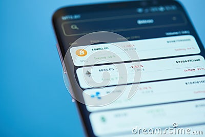 Price of bitcoin on mobile screen Editorial Stock Photo