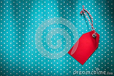 Price tag on blue polka-dot background Stock Photo