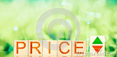 Price. wooden blocks labeled price and up and down arrows. Stock Photo