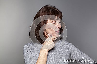 Pride and arrogance for offended beautiful mature woman Stock Photo