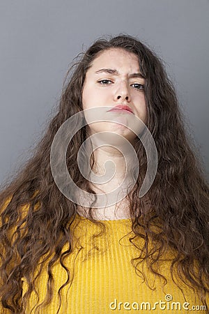 Pride and arrogance for offended big young woman Stock Photo