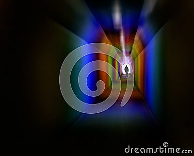 Pride LGBTQ Rainbow Person Walking in a Dark Tunnel Trying to Find their Way as a Silhouette Stock Photo