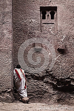 Priest at ancient christian orthodox church in lalibela ethiopia Editorial Stock Photo