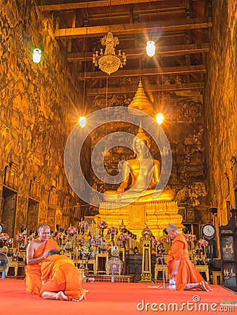 Priest is chanting in Wat Suthat Thep Wararam Editorial Stock Photo