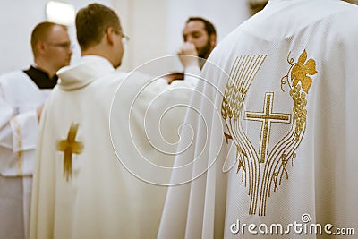 Priest` hands during a wedding ceremony/nuptial mass Editorial Stock Photo