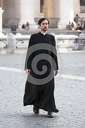 Priest walking (Vatican City) Editorial Stock Photo