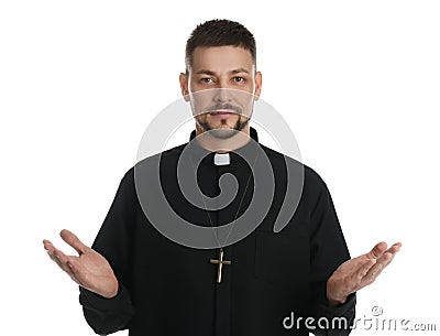 Priest wearing cassock with clerical collar on white background Stock Photo