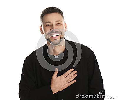 Priest wearing cassock with clerical collar on white background Stock Photo