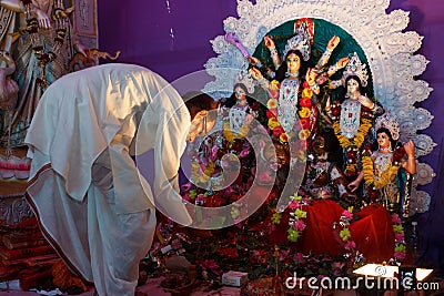 Priest worshiping in Hindu temple Editorial Stock Photo