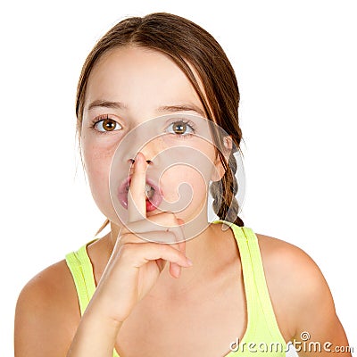 Primary Aged Girl Making Shush Gesture Stock Photo