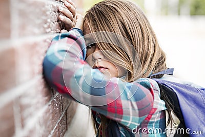 Primary student depress at the school Stock Photo