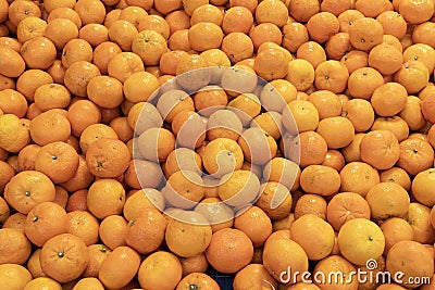 Gennevilliers, France - 01 21 2022: Primeur fruits and vegetables. Detail of clementines at a greengrocer Stock Photo