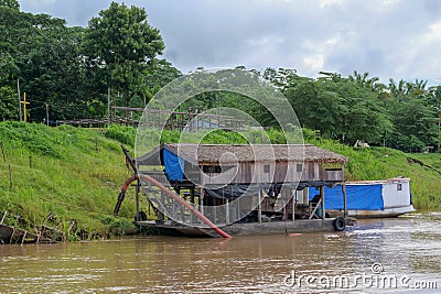 Primitive gold mining operations on the Amazon river in the Amazon rainforest in Brazil, 2023 Stock Photo