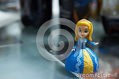 Princess figures in yellow blue dress in toy concept Editorial Stock Photo