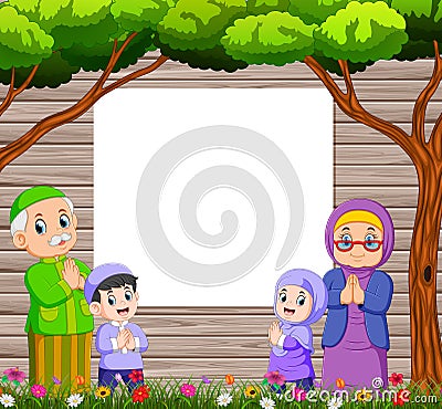 grandmother and grandfather with their grandchild are giving the greeting of ied mubarak near the blank board Vector Illustration