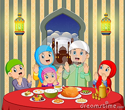 A happy family are praying before eating in their house with beautiful view from the window Vector Illustration