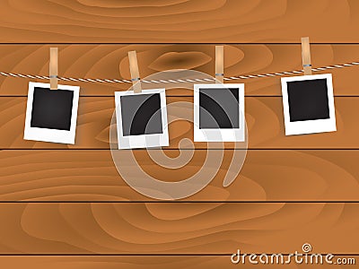 Retro photos on rope on wooden backgrounds Vector Illustration