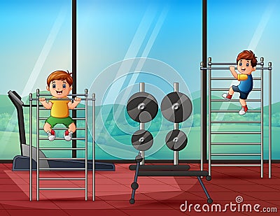 Cheerful little boys pulling himself up on a sport Stock Photo